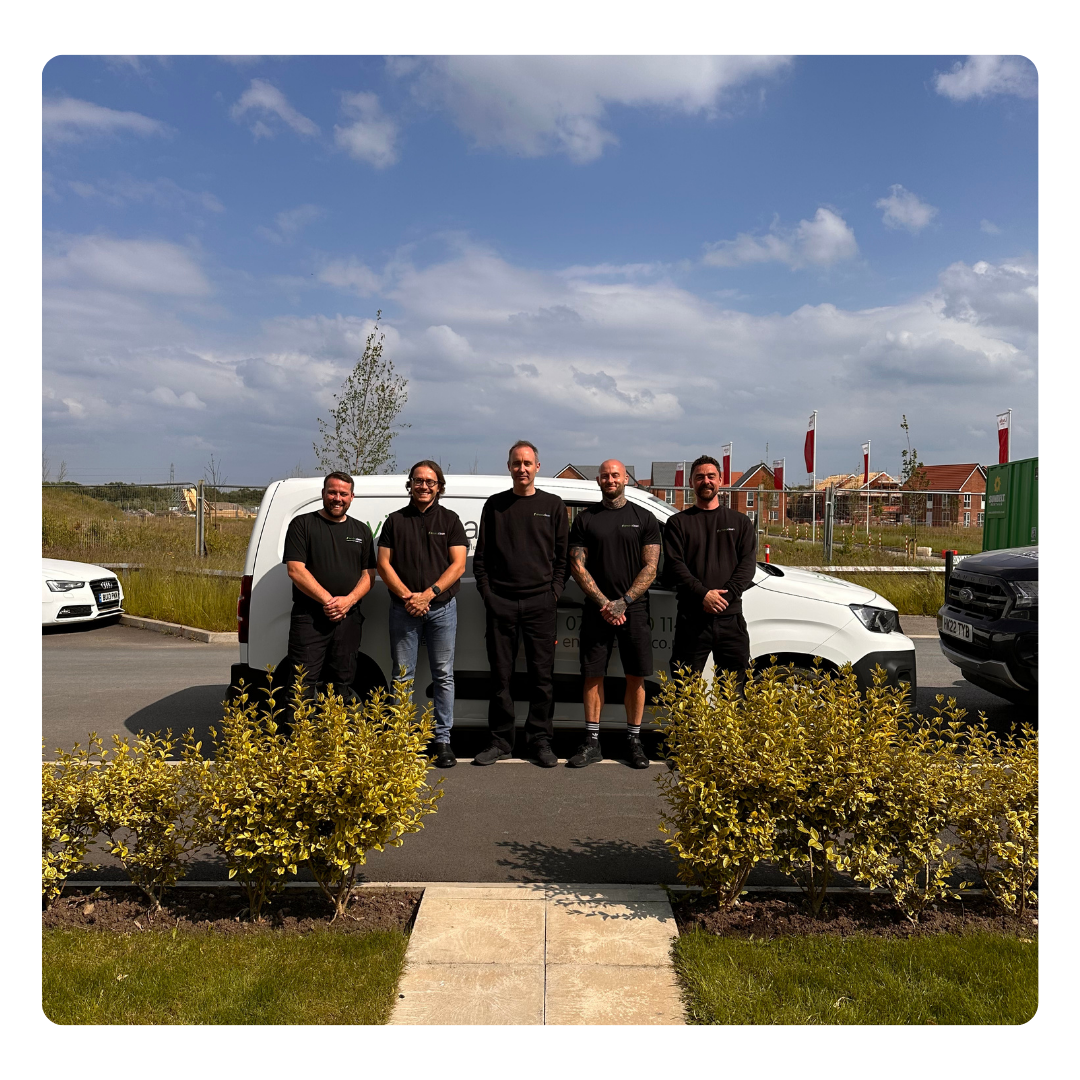 Professional Enviro Clean team gathered, showcasing collaboration and innovation.