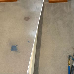 Blue paint carpet spill