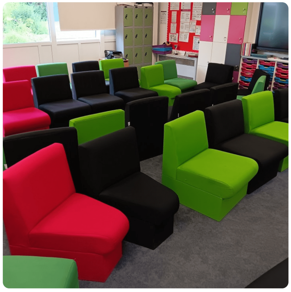 A colorful classroom showcasing a variety of chairs, adding a fun and dynamic touch to the learning space.