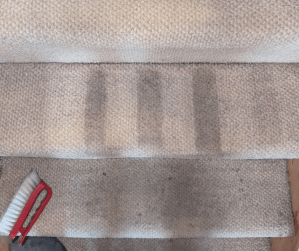 stained discoloured stairs being professionally cleaned, partially cleaned to show the difference it makes.